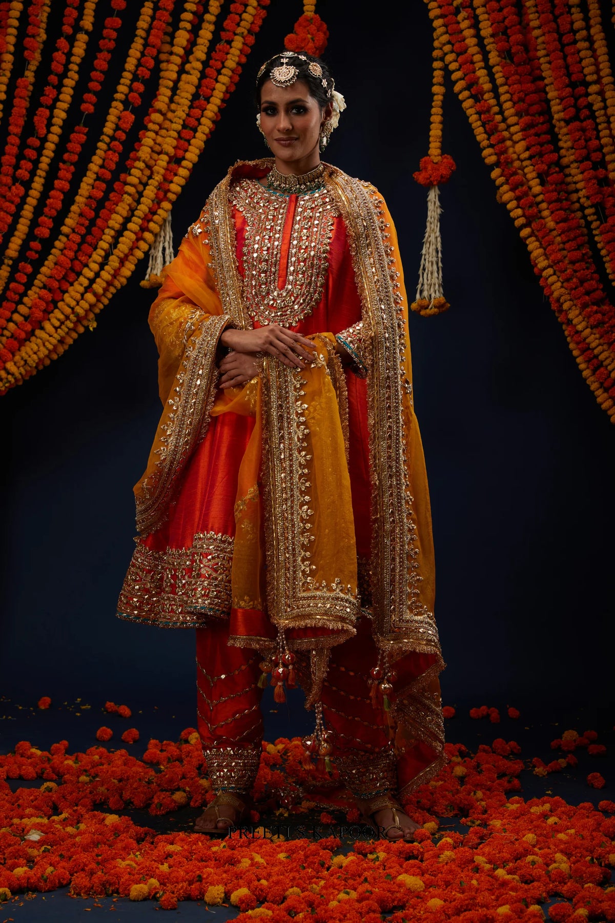 Woman wearing Rust Red raw silk Anarkali with Mustard Yellow organza dupatta – Preeti S Kapoor