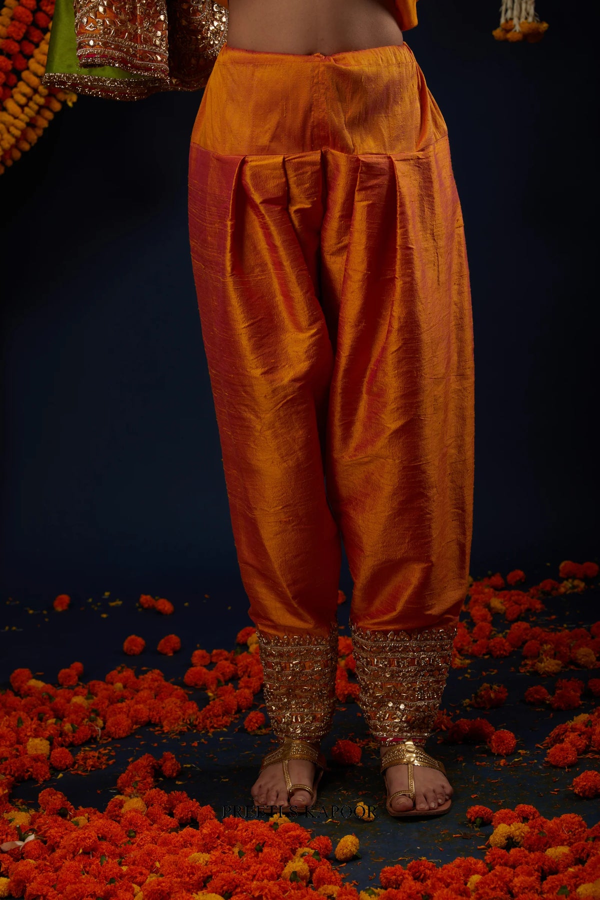 Close-up of gathered salwar with gold embroidered ankle cuff – Preeti S Kapoor