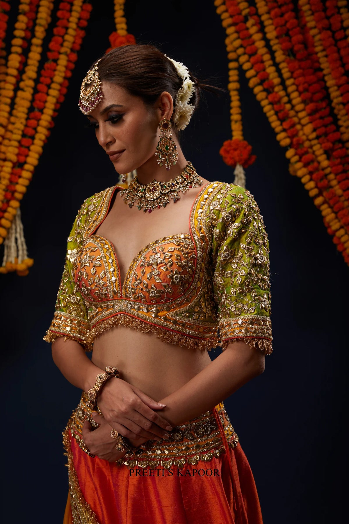 Close-up of sweetheart neckline blouse with Gota Patti embroidery – Preeti S Kapoor