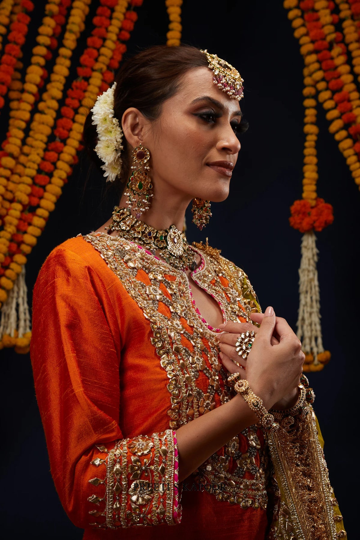 Close-up of Orange kurta neckline with gold trellis embroidery – Preeti S Kapoor