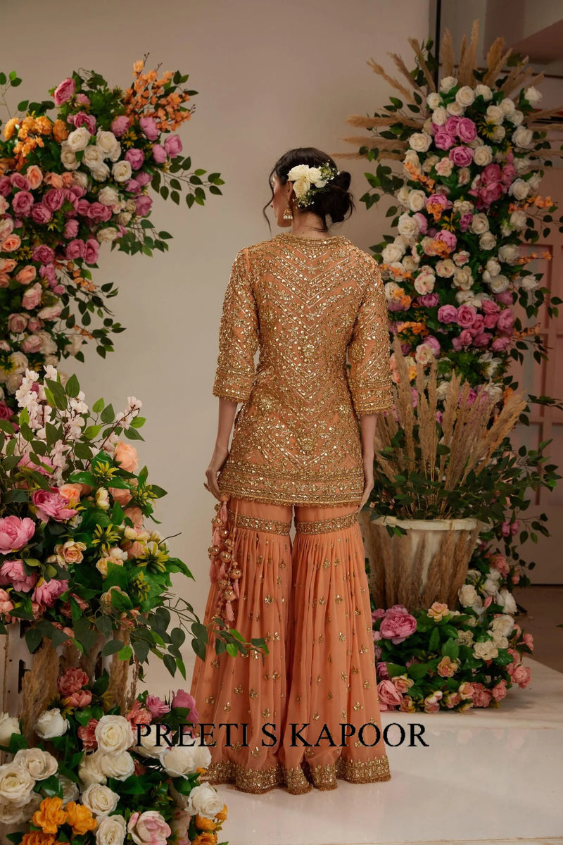 Soft peach short kurta with garara and organza dupatta - Preeti S Kapoor