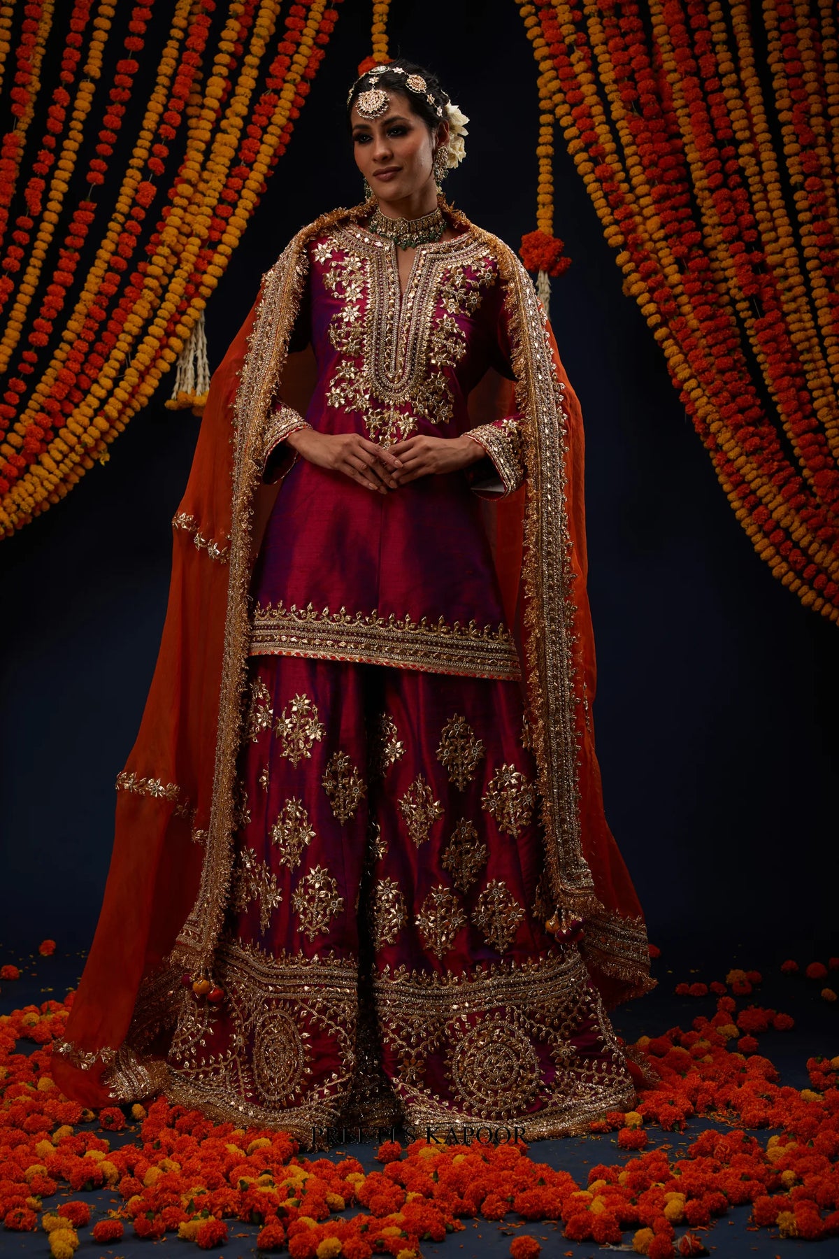 Woman wearing Wine Magenta raw silk kurta sharara with Rust Orange dupatta – Preeti S Kapoor