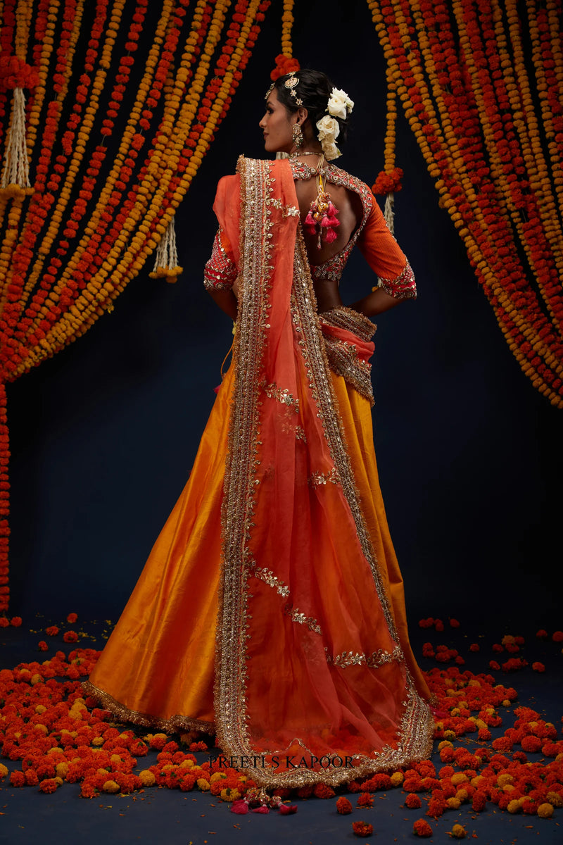 Marigold Yellow raw silk lehenga back view with cutout detail – Preeti S Kapoor