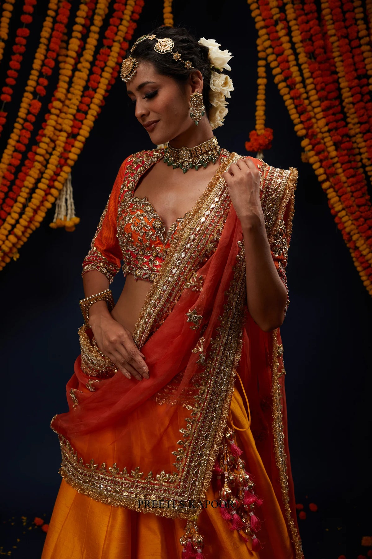 Close-up of Rust Red ombre organza dupatta with gold embroidered border – Preeti S Kapoor