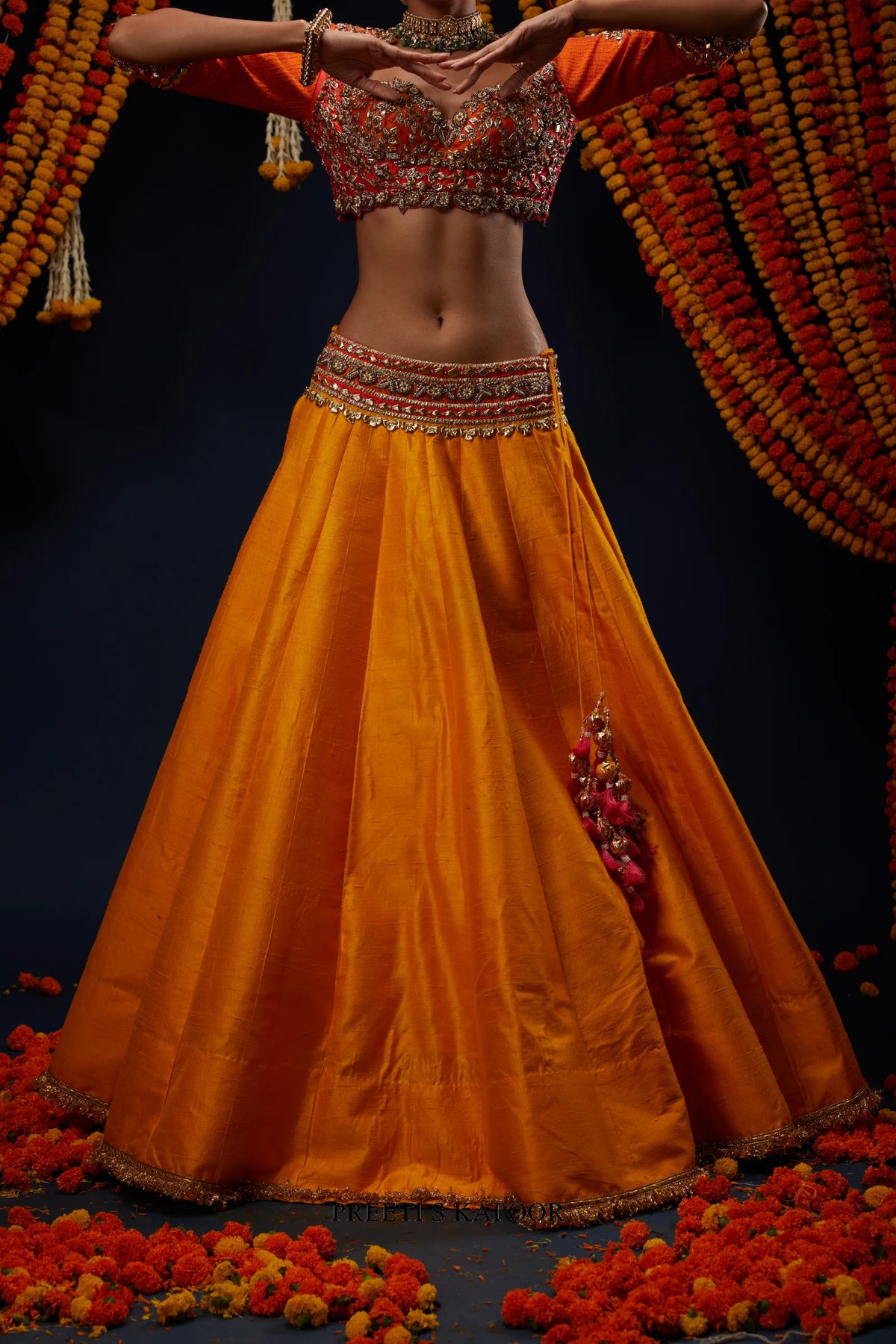 Close-up of Marigold Yellow raw silk lehenga with embroidered waistband – Preeti S Kapoor