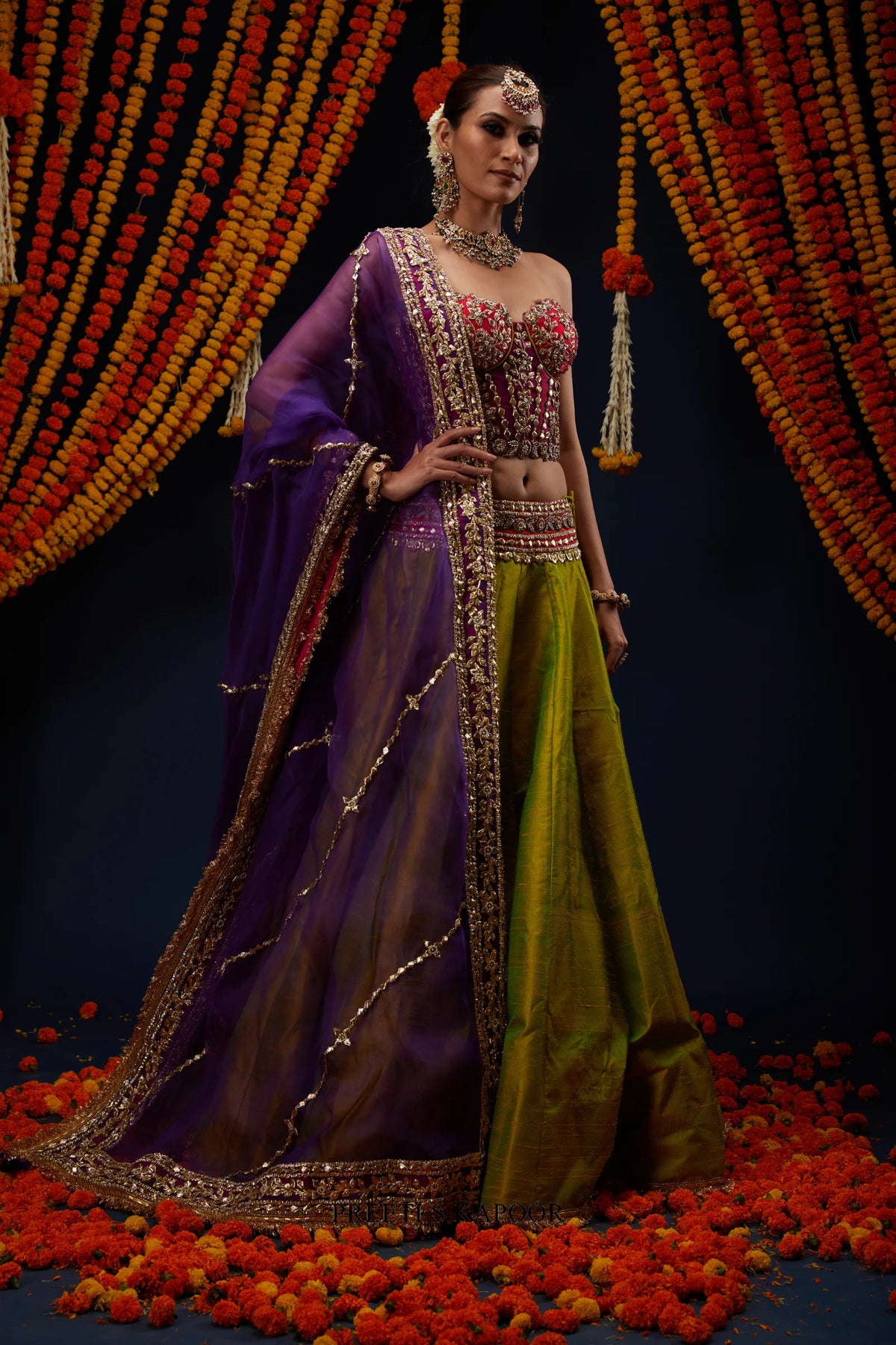 Mehendi Green lehenga styled with Purple organza dupatta – Preeti S Kapoor