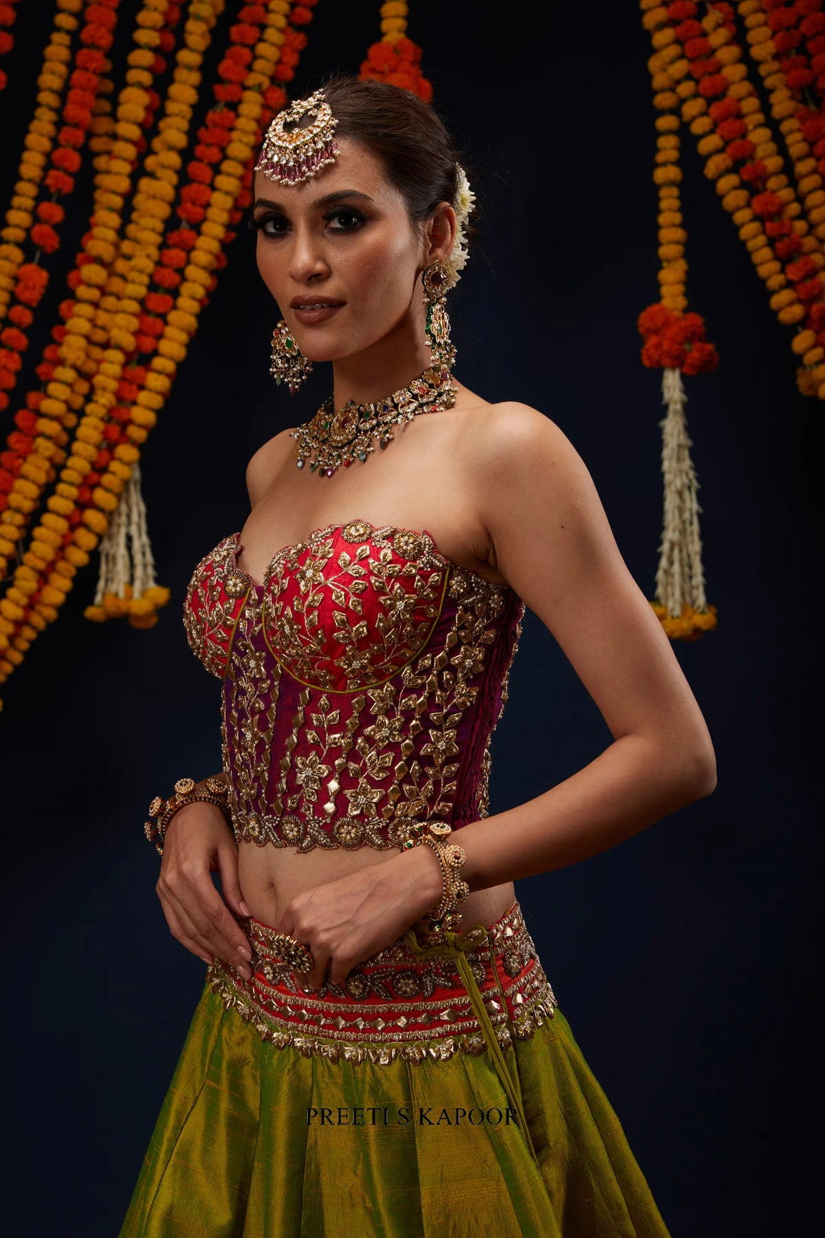 Close-up of Fuchsia Pink strapless bustier blouse with floral gota embroidery – Preeti S Kapoor