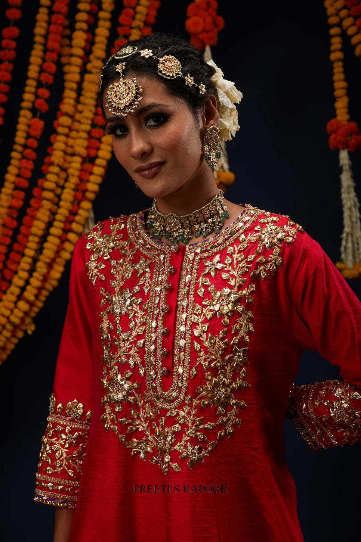 Close-up of Red kurta neckline with gold gota floral embroidery – Preeti S Kapoor